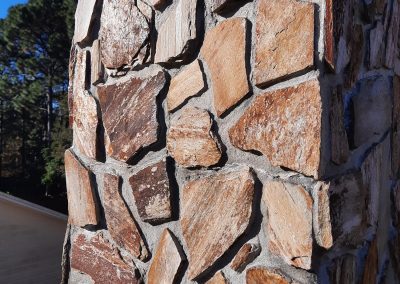 Stone masonry chimney